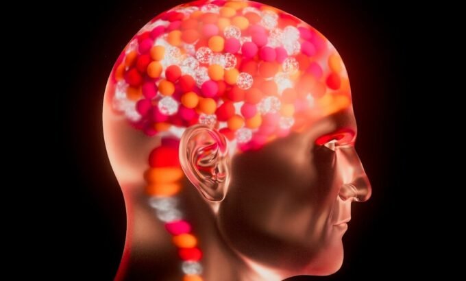 A woman's head with colorful beads on it