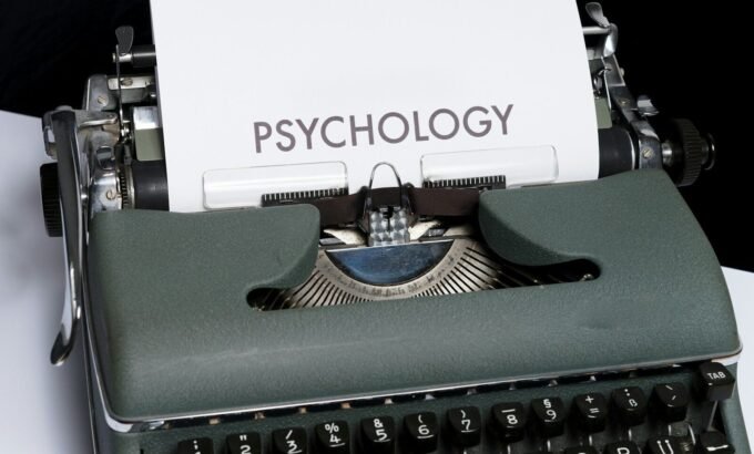 a close up of a typewriter with a paper on it